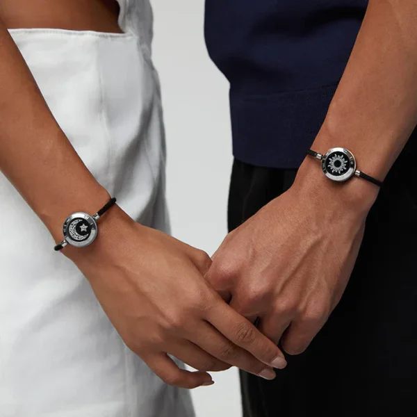 Couple wearing Totwoo Smart Bracelet with Sun and Moon Design