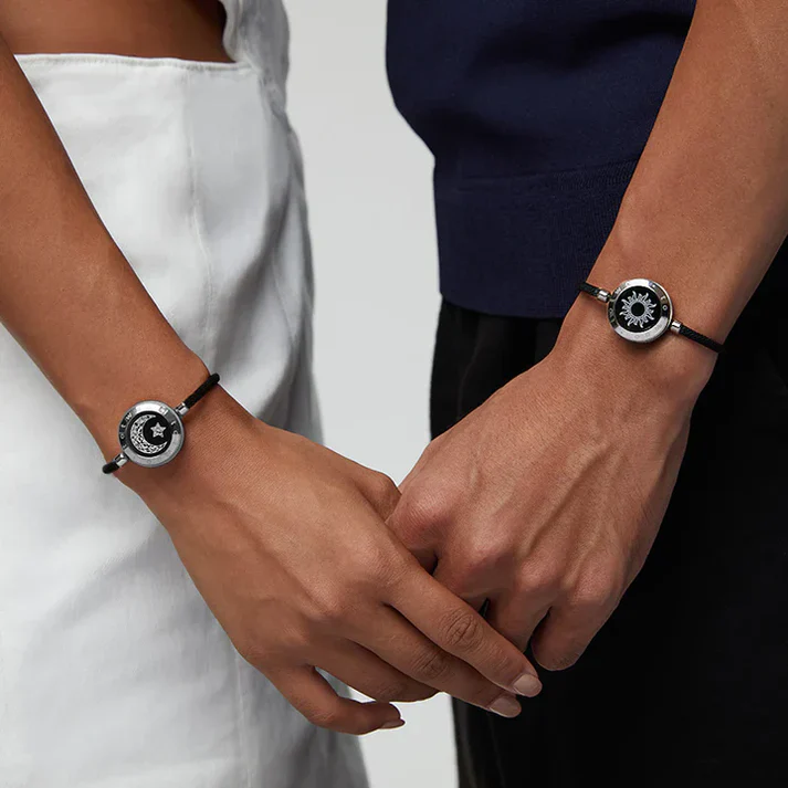 Couple wearing Totwoo Smart Bracelet with Sun and Moon Design